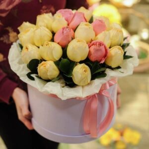 Hat-boxes floral arrangement by Lavender and Lilacs Florist