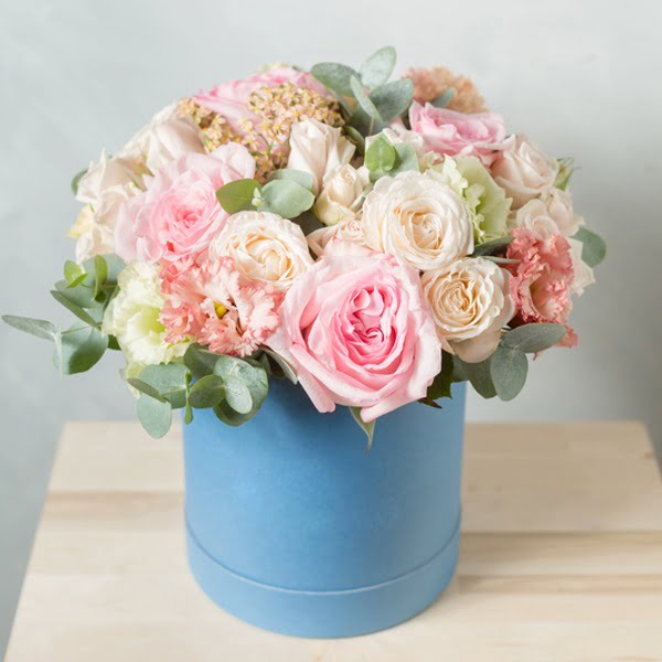Hat-boxes floral arrangement by Lavender and Lilacs Florist